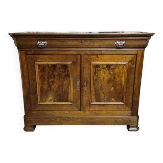 Low buffet with a curved front from the Louis Philippe period in walnut.