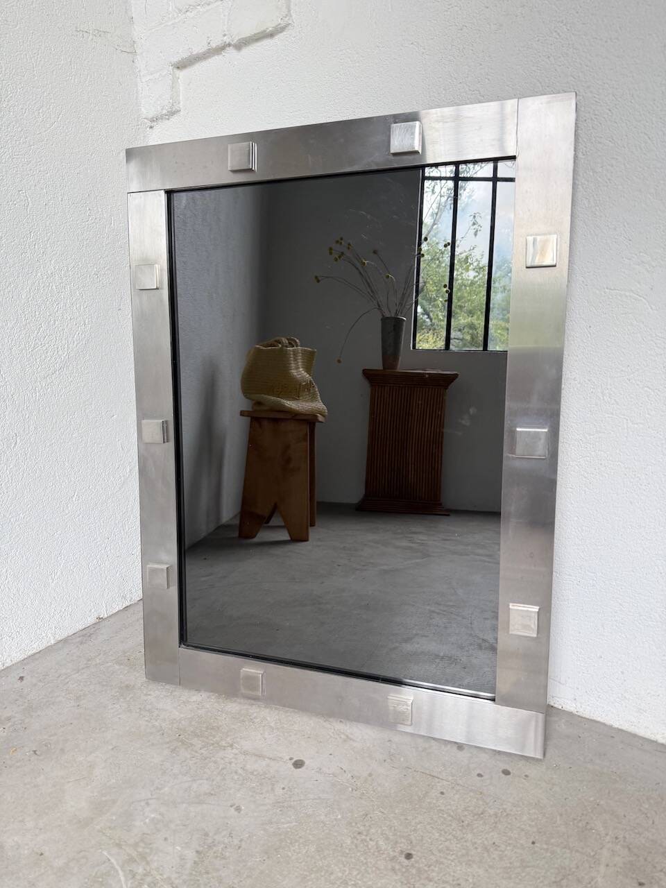 Chrome mirror from the 1970s.