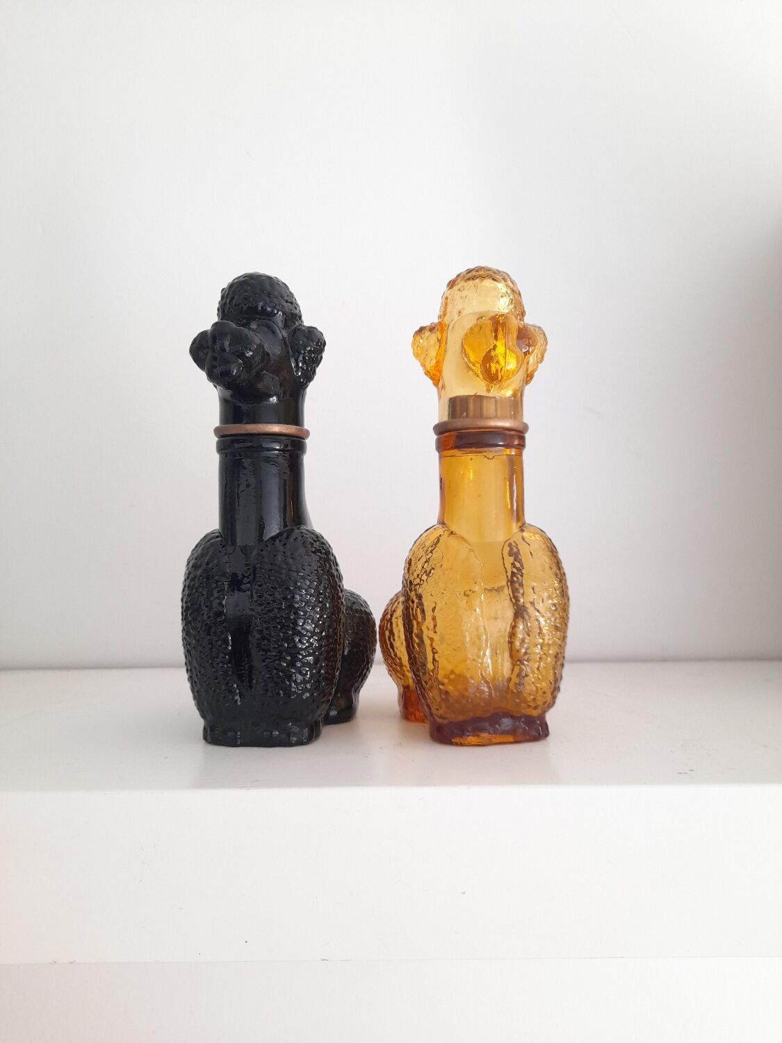Set of two Empoli poodle glass bottles