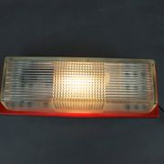 1970s Czech space age wall light with red plastic and glass.
