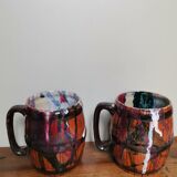 Set of 2 vintage enameled ceramic slip mug mugs signed Safi