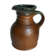 Pitcher traditional pottery Folk art in old enamelled sandstone