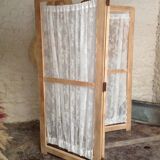Ancient wood and lace screen