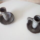 Pair of speckled sandstone candle holders