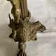Pair of 19th-century gilded bronze candlesticks in Empire style.