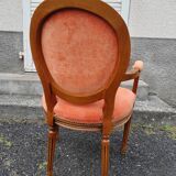 Fauteuil médaillon tapissé orange