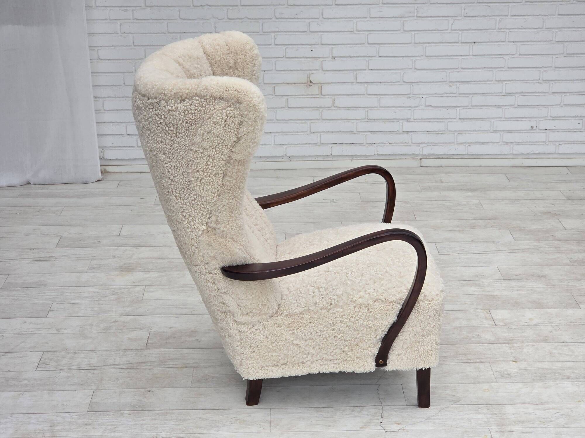 1960s, Danish high-back armchair, genuine sheepskin, reupholstered.