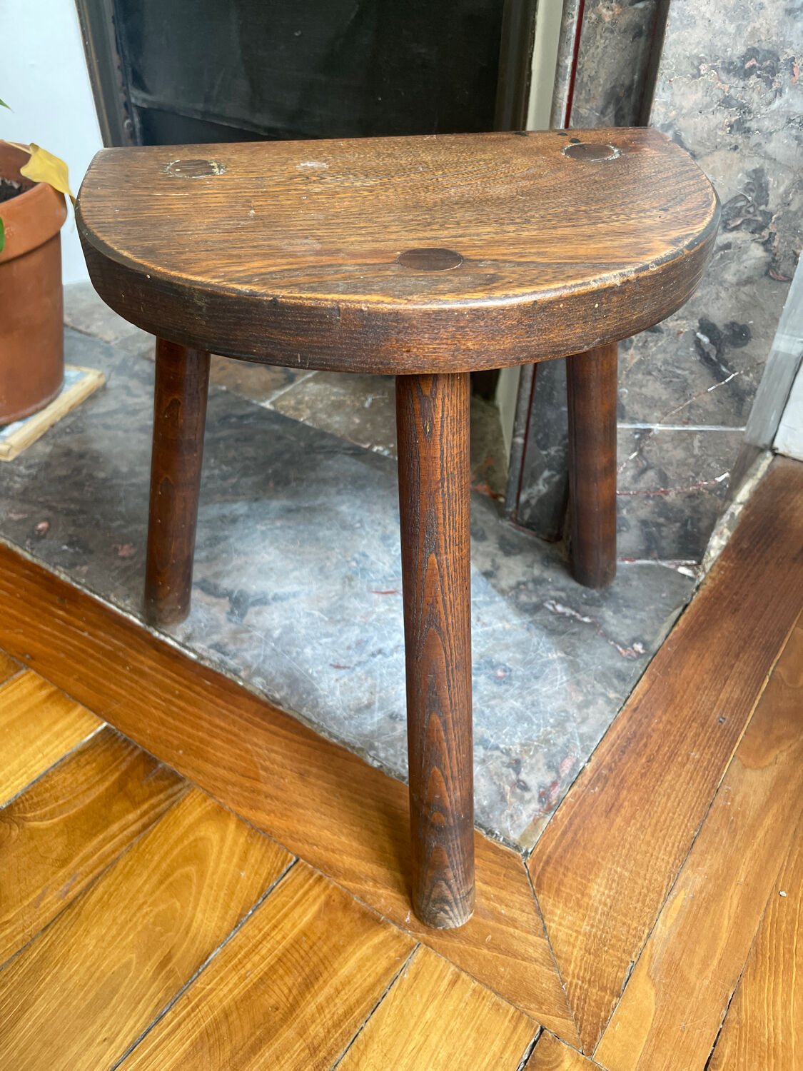 Dark wood tripod stool