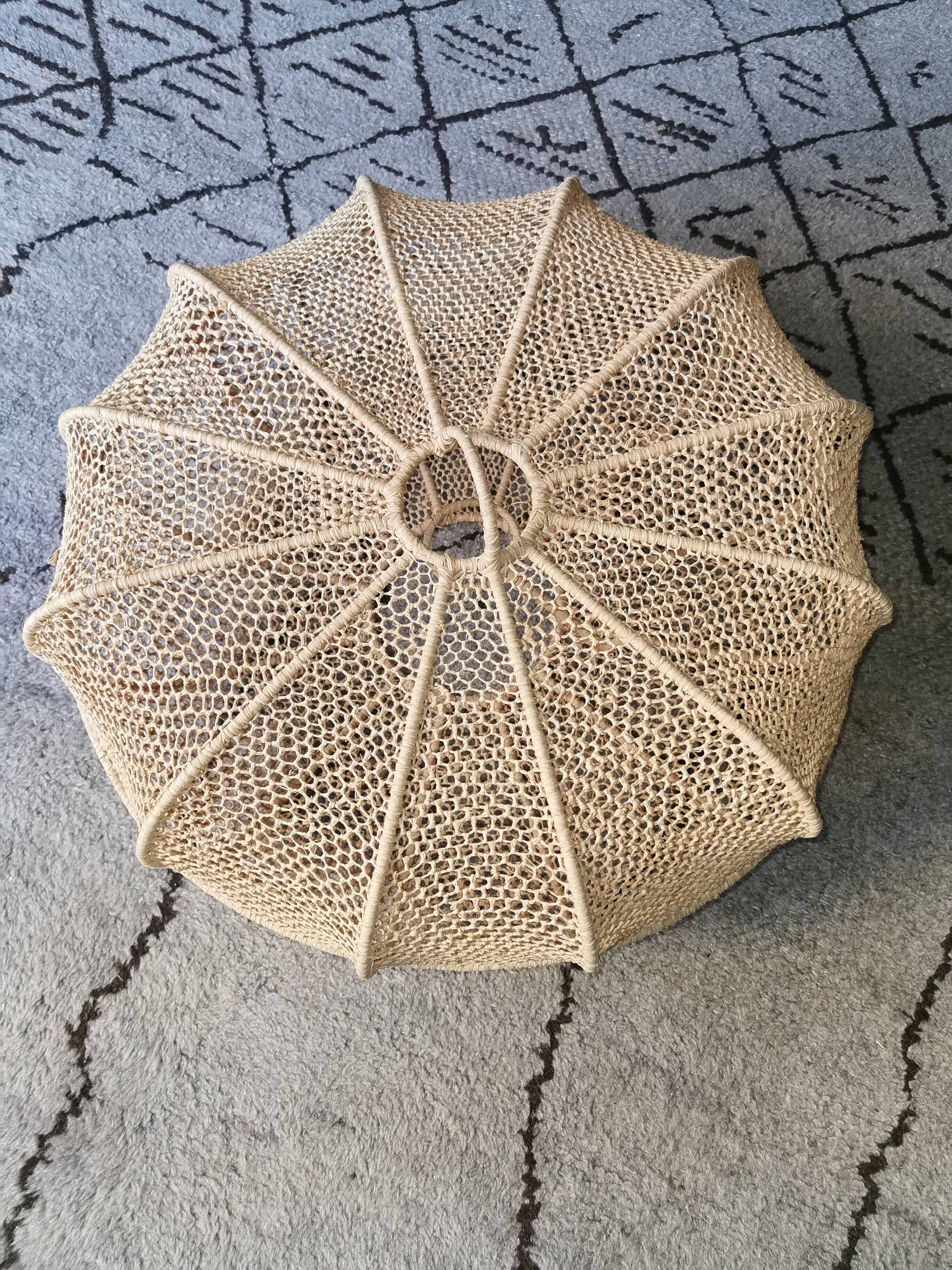 Handmade raffia suspension light