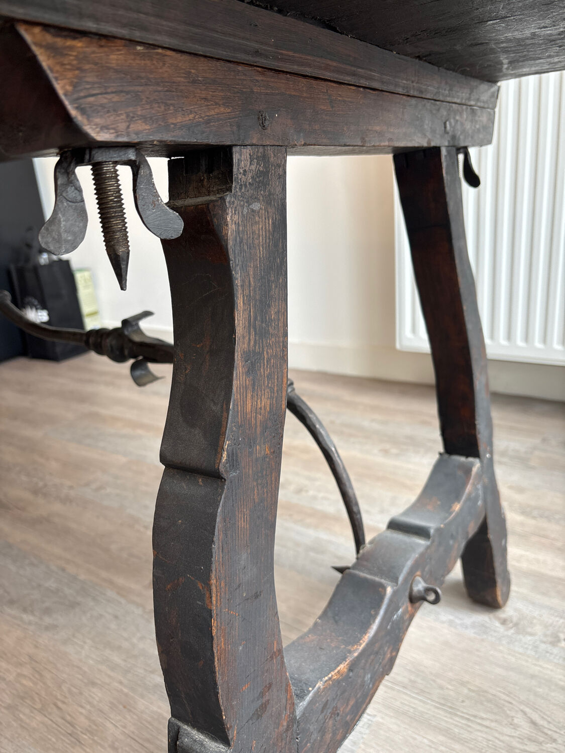 Solid wood farmhouse table with ebony finish.