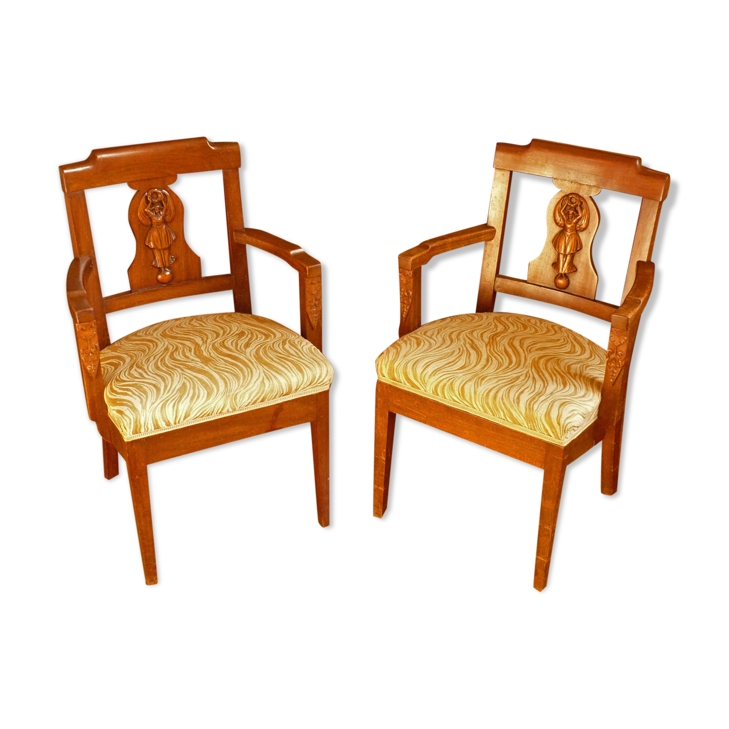 Paire de fauteuils sculptés