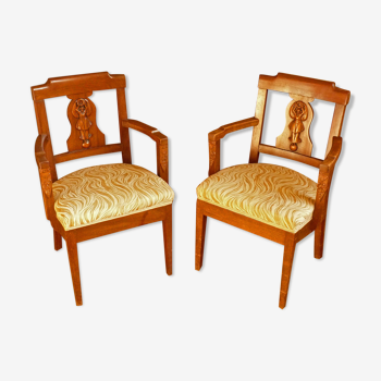 Pair of carved armchairs