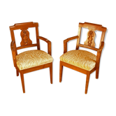 Paire de fauteuils sculptés