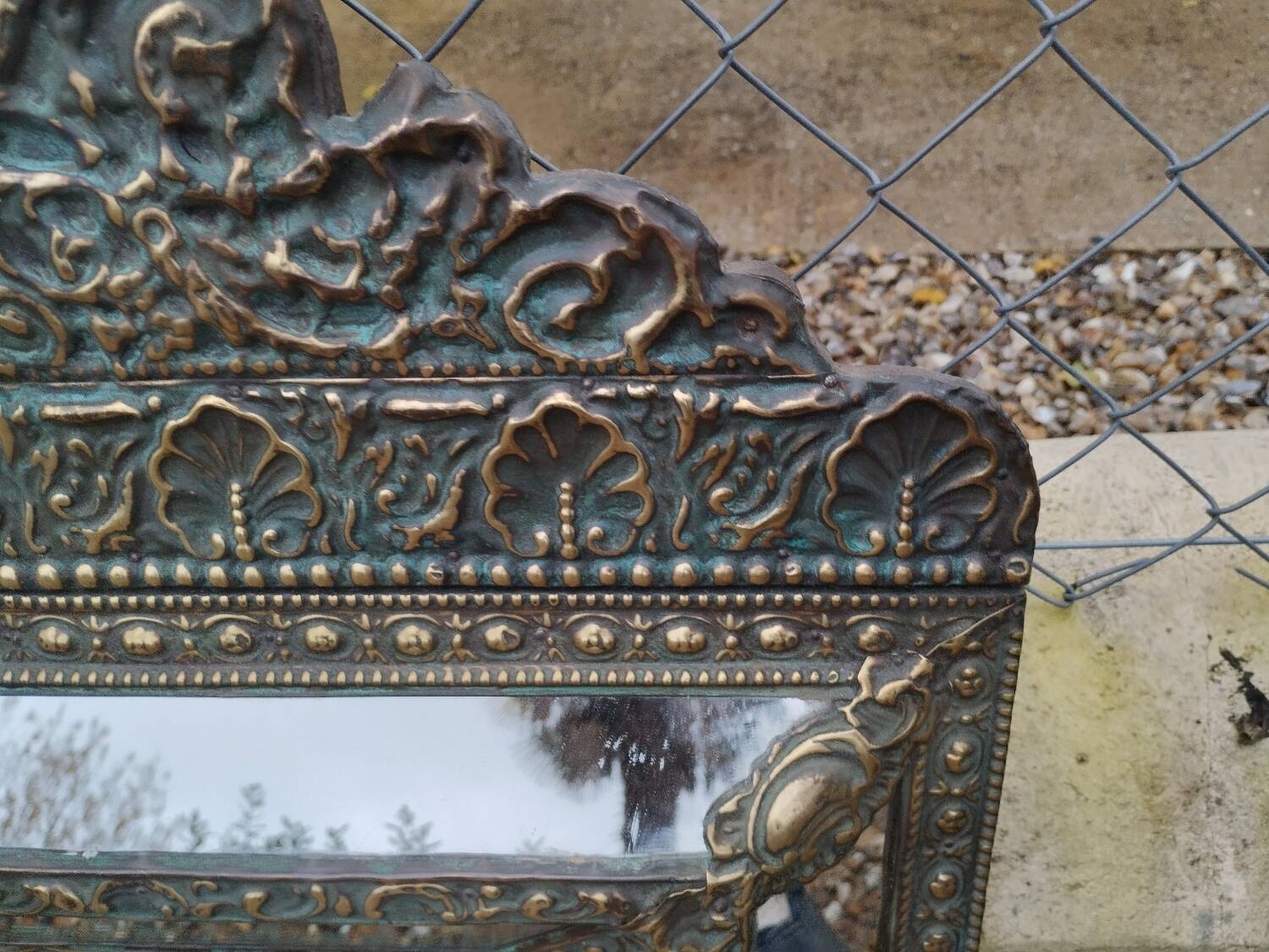 Antique mirror with copper moulding.
