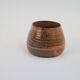 Petit pot en céramique tourné orange et marron