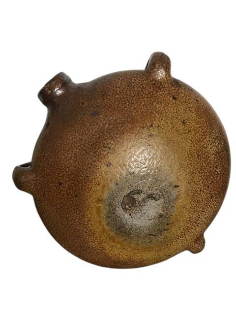 Old stoneware flask known as a toad from the 19th century.
