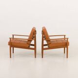 Rare Grete Jalk teak lounge chairs in aniline cognac leather for Cado