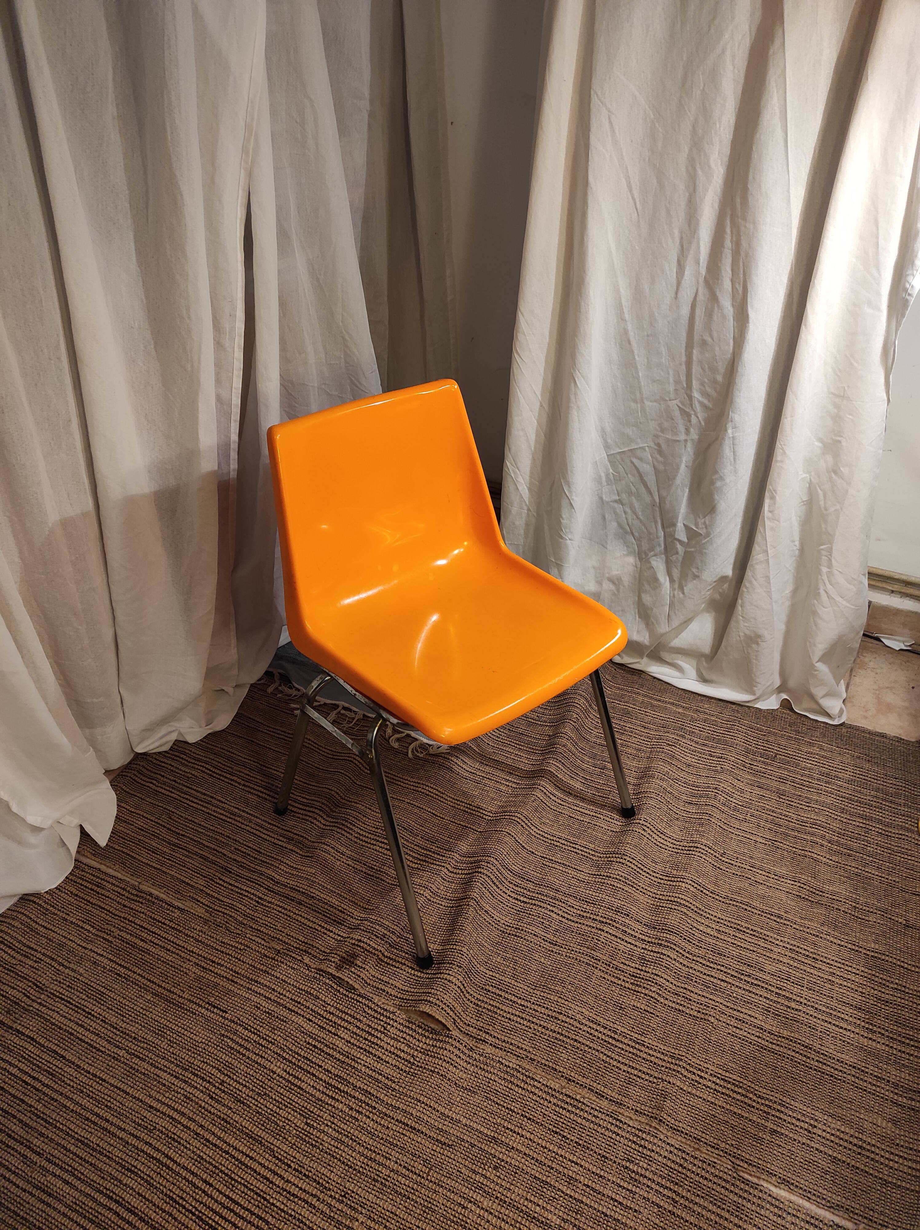 Orange plastic chair 1970