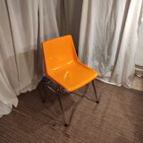 Orange plastic chair 1970
