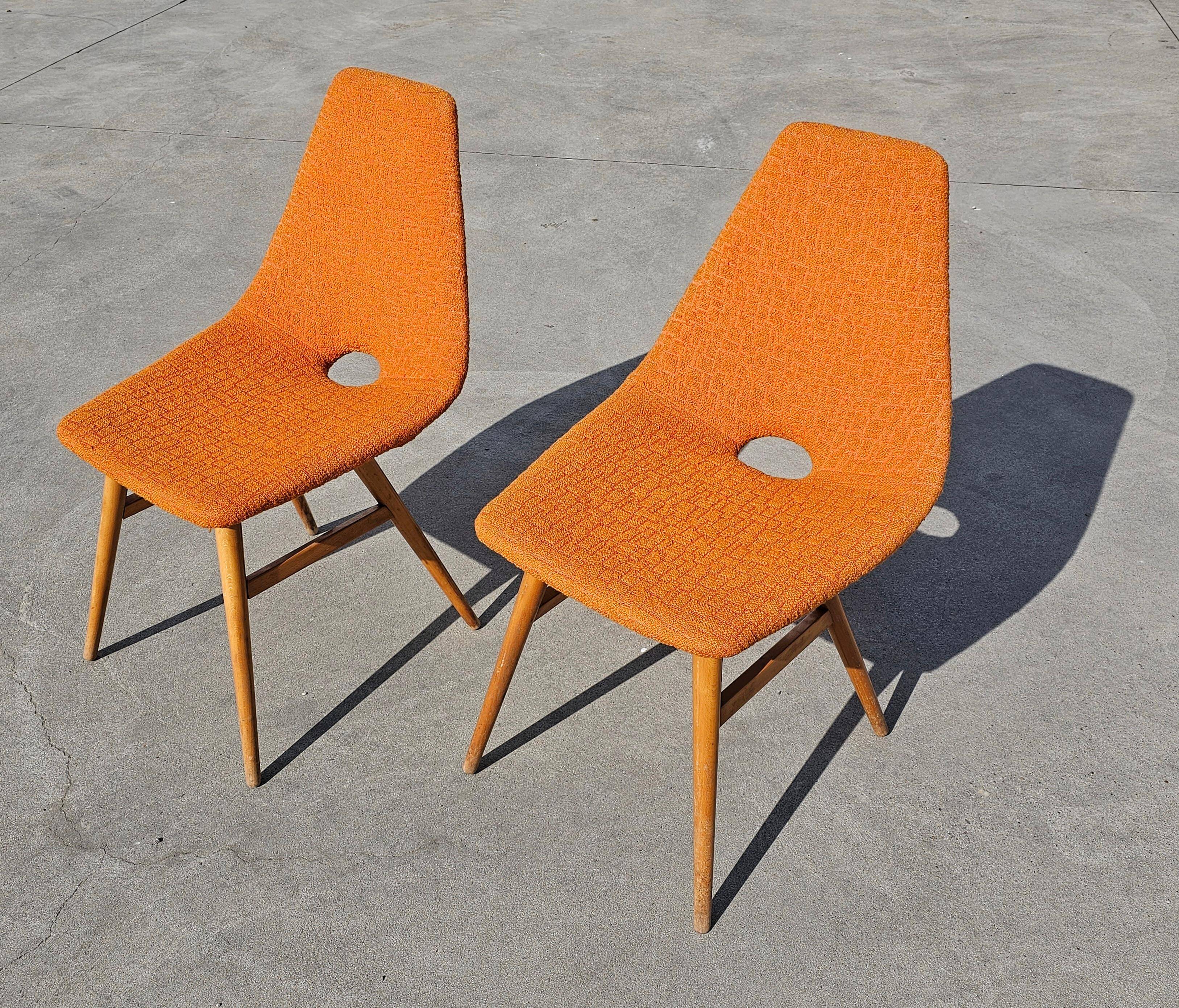 Pair of Mid-Century Modern accent chairs by Judit Burian and Erika Szek.