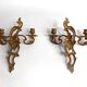 Pair of Rococo wall sconces in gilded bronze, Hollywood Regency, from the years.