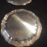 Four silver metal bottle bottoms