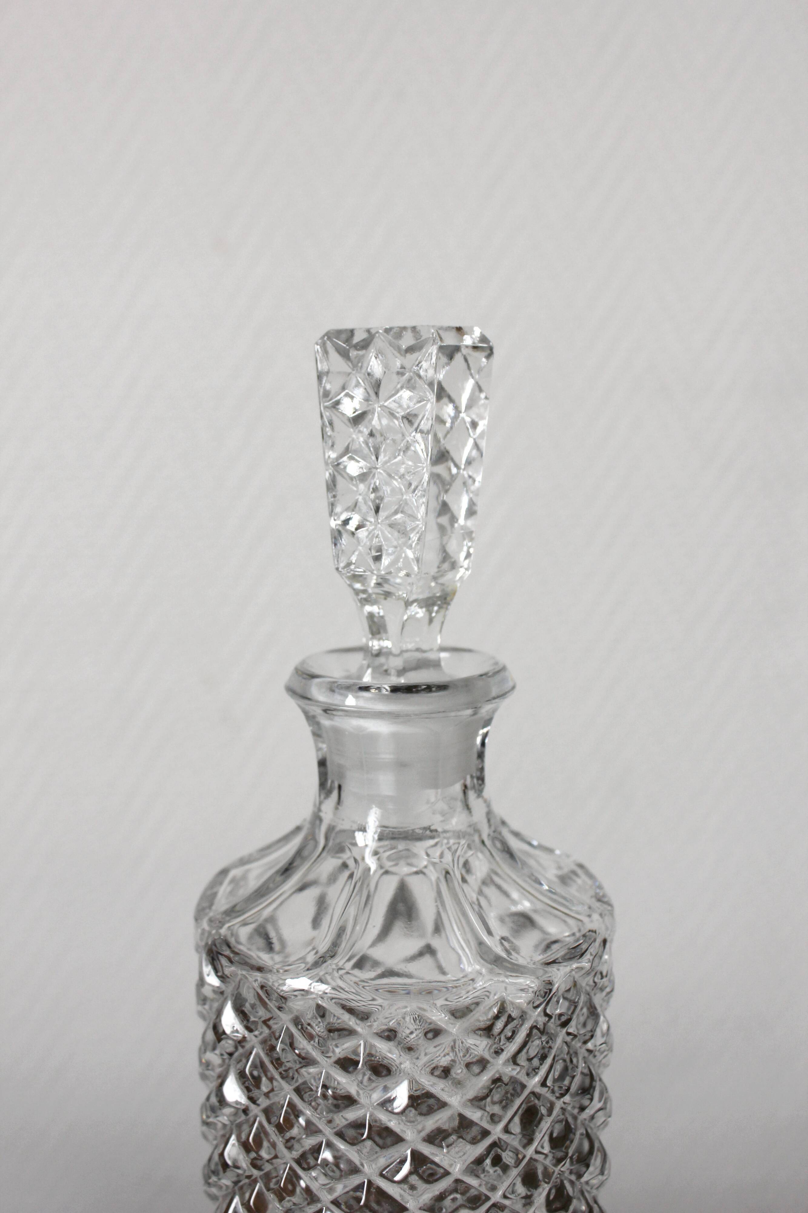 Vintage faceted cut glass round whisky decanter