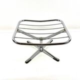 Brown leather ottoman on chrome base