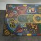 Chrome steel coffee table with zodiac signs decoration.