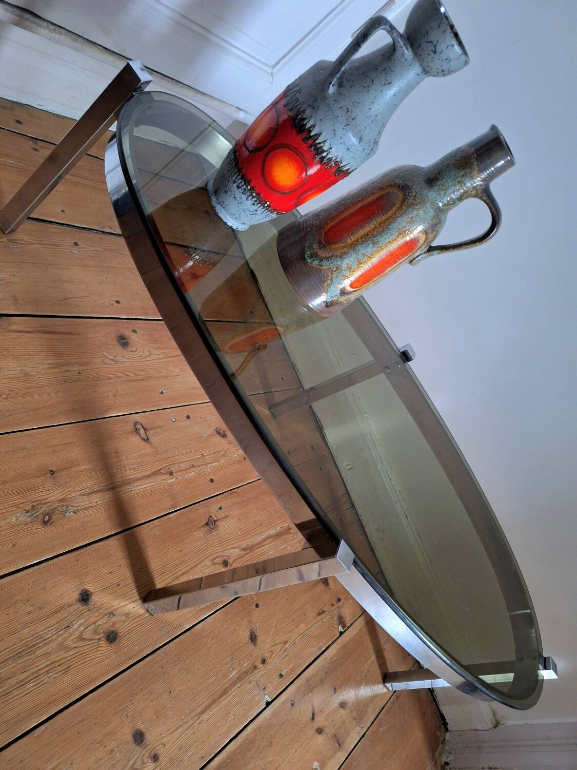 Vintage oval chrome and smoked glass coffee table, antique furniture