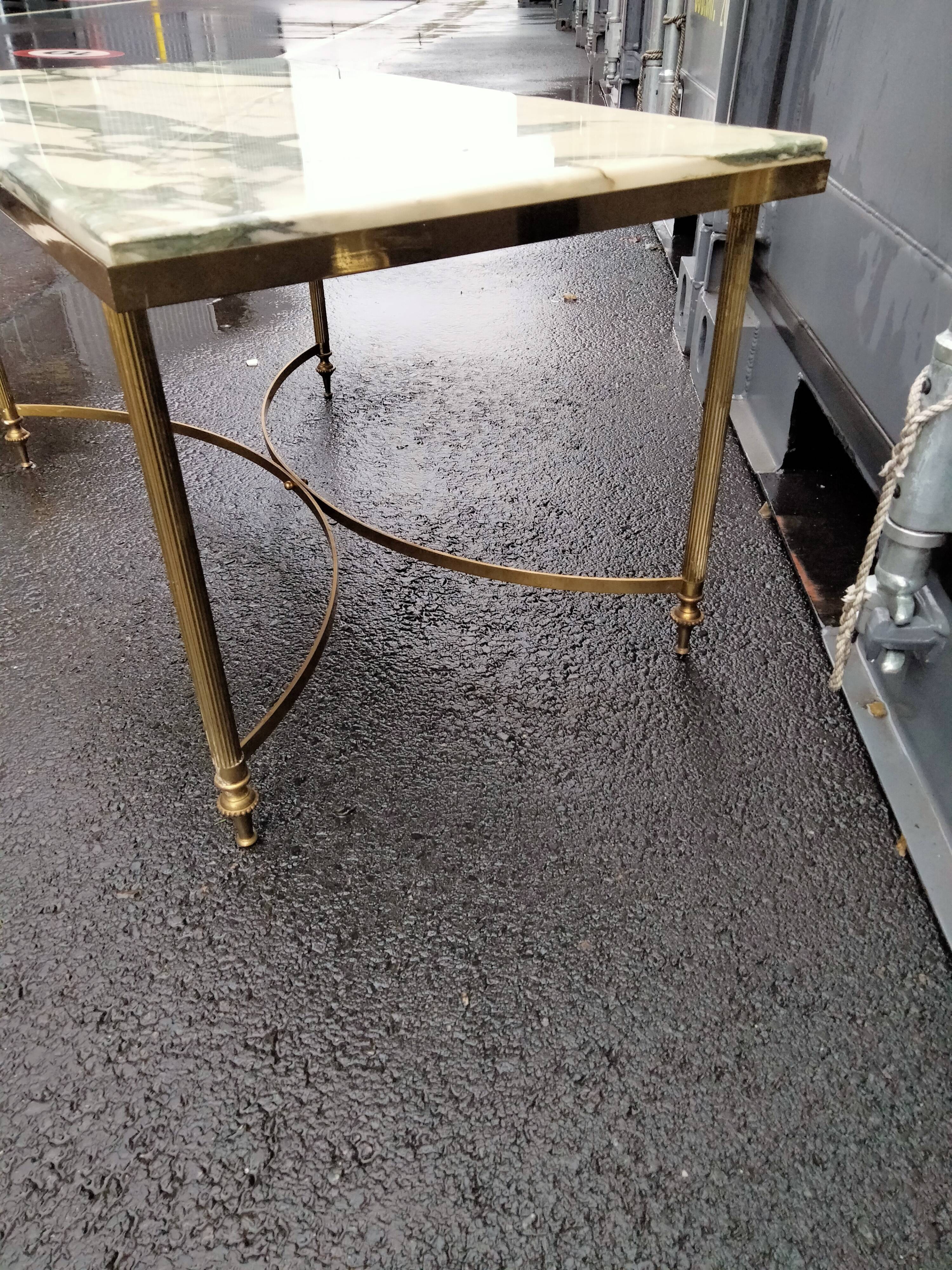 Old vintage gilded side table with marble top