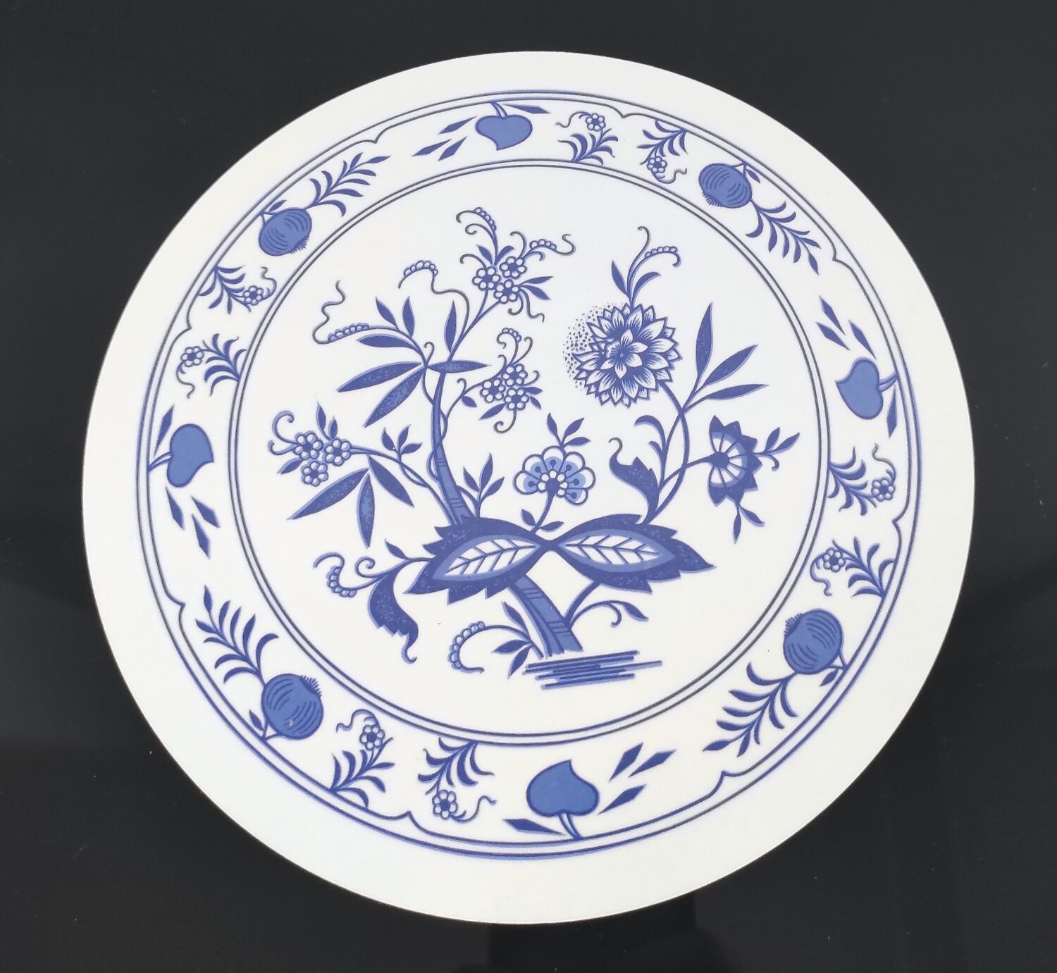 Vintage round trivet with blue floral pattern - 1970s