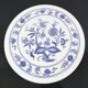 Vintage round trivet with blue floral pattern - 1970s