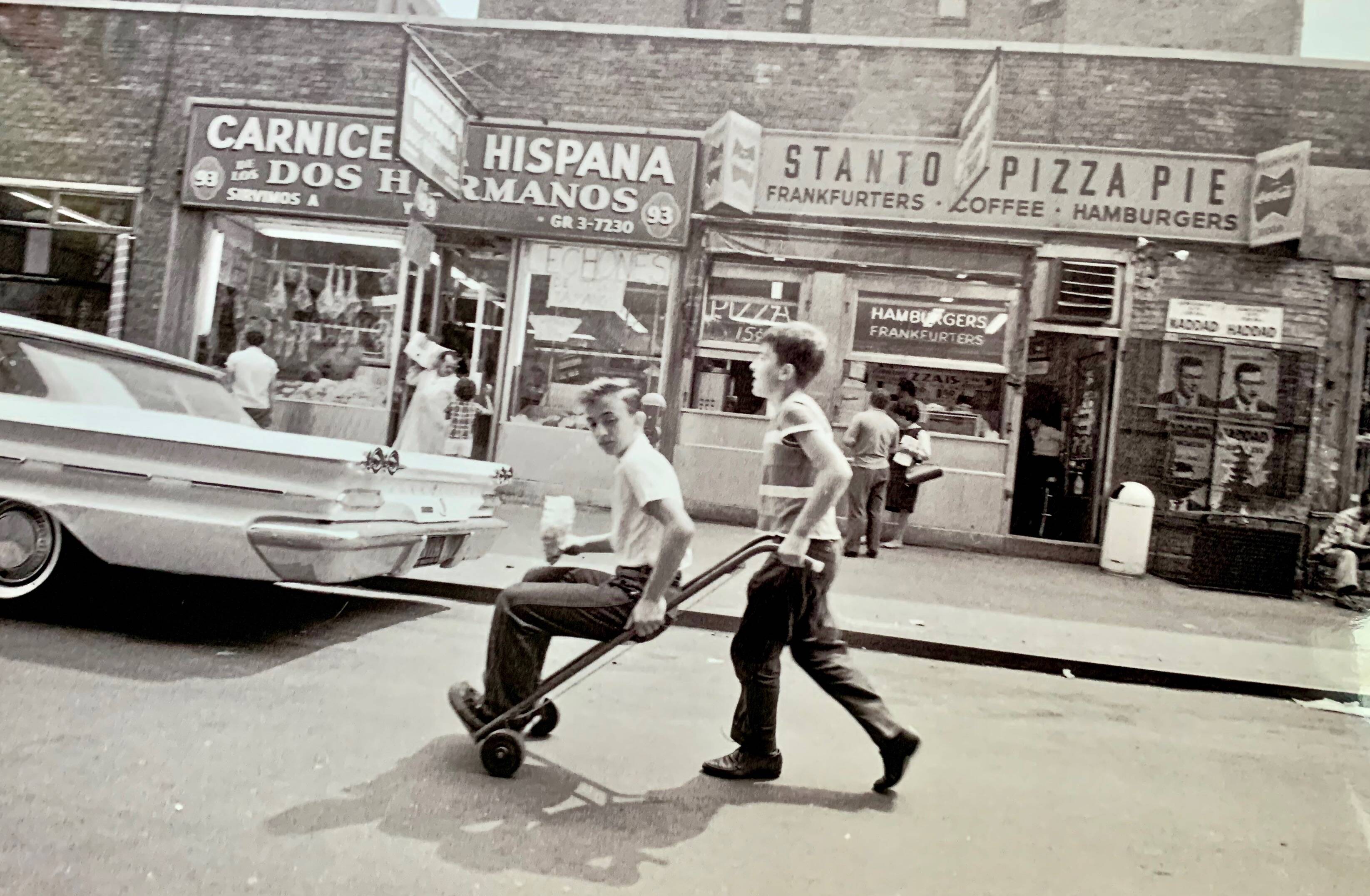 Little Italy – NYC 1964 A lively and spontaneous street scene.