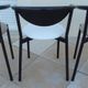 6 gondola-style chairs with a metal structure for indoor and outdoor use.