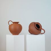 Pair of handcrafted terracotta vases from the mid-century.