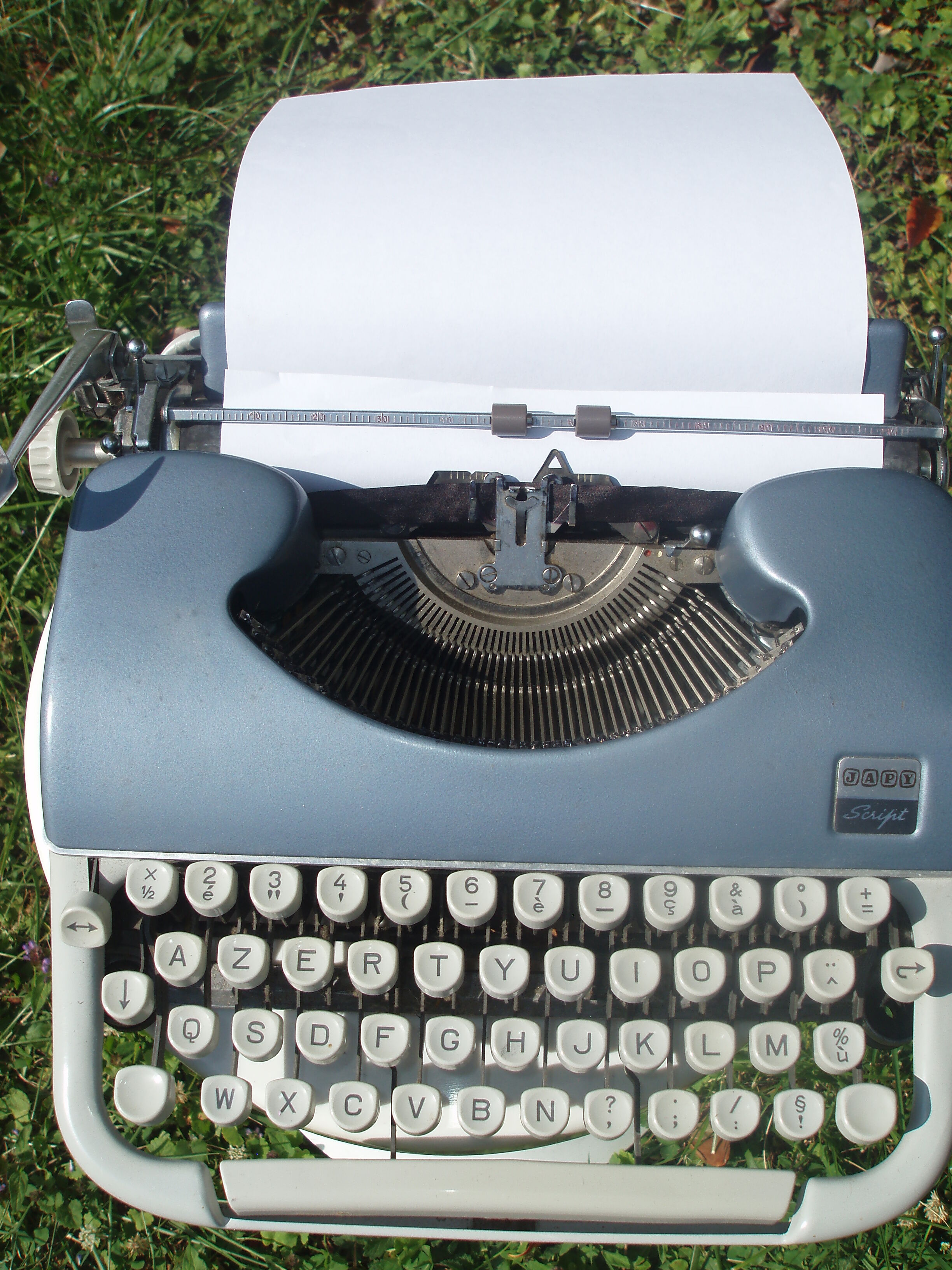 Typewriter blue japy script  with manual and carrying case