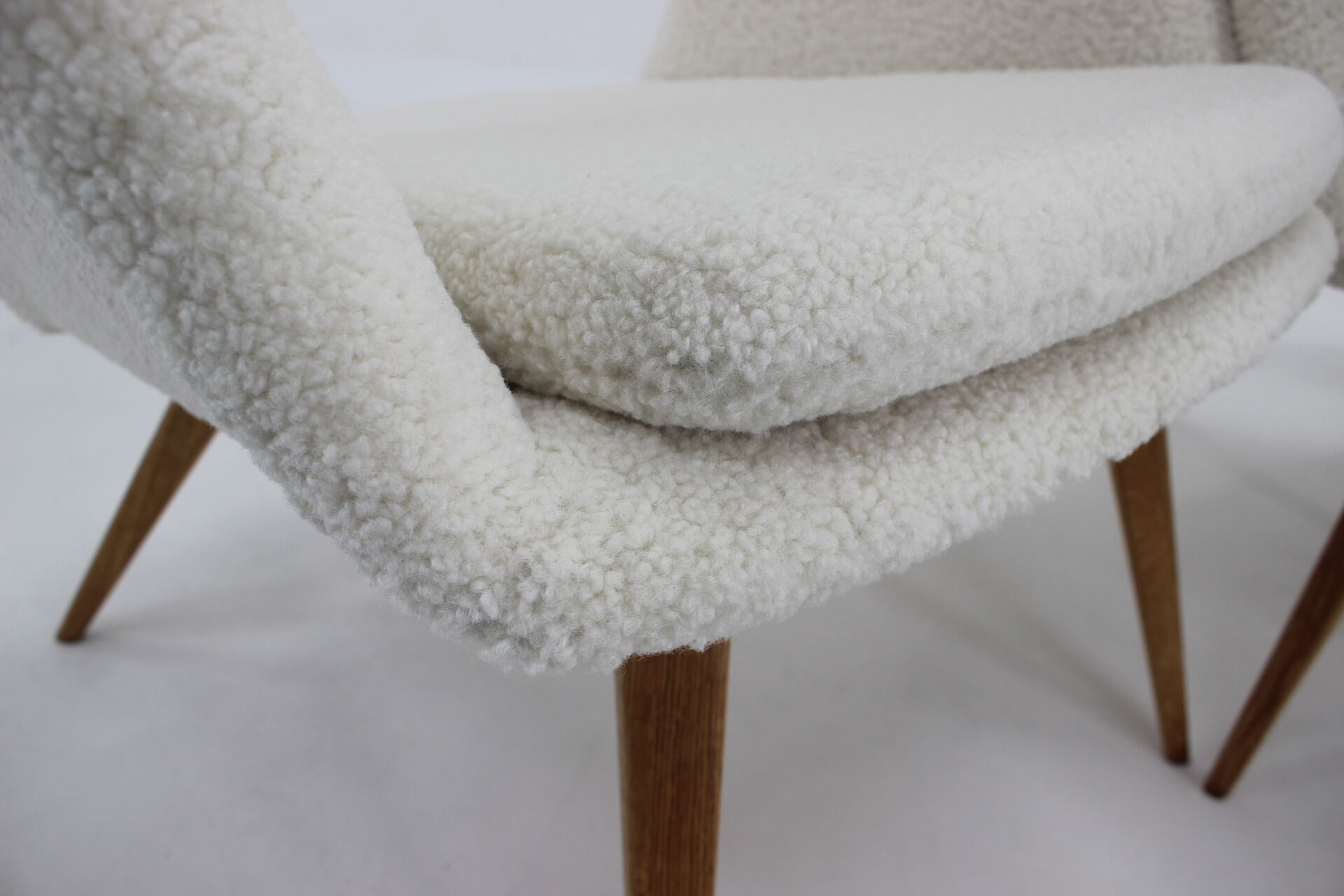Pair of miroslav navratil shell lounge chairs in sheepskin fabric, czechoslovakia, 1960