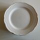 Set of 7 Mougins plates in white enamelled clay with gadroons