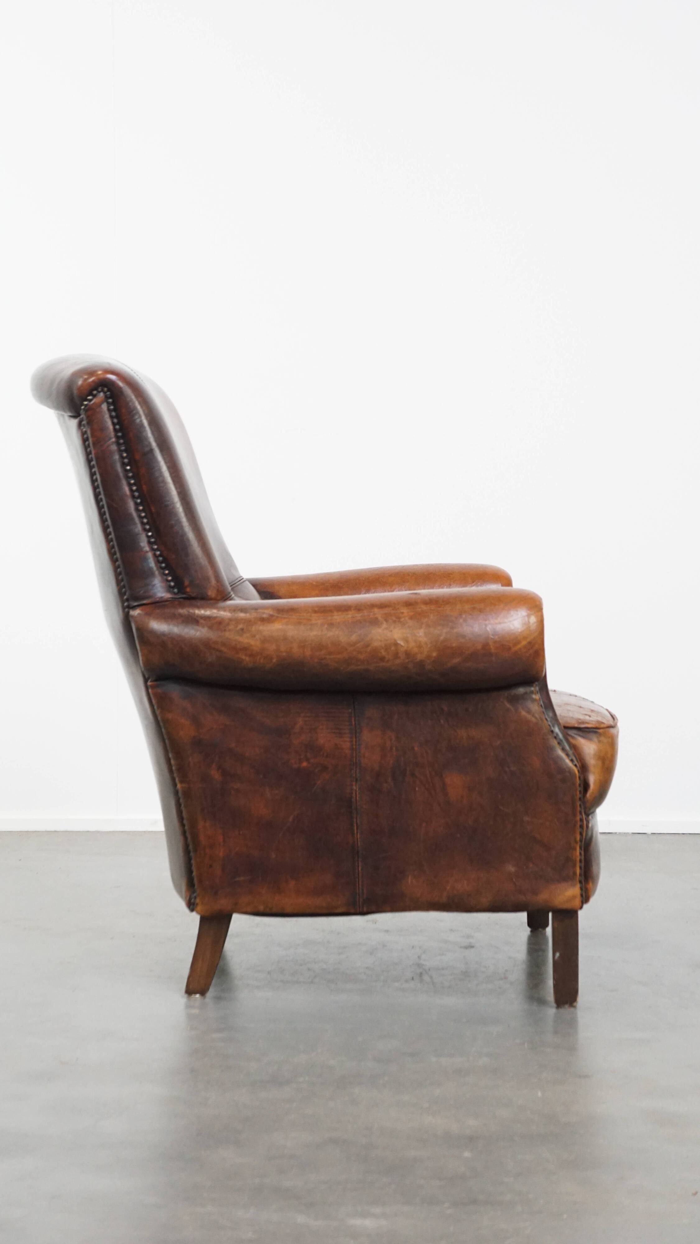 Fauteuil vintage en cuir de mouton avec dossier haut
