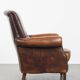 Fauteuil vintage en cuir de mouton avec dossier haut