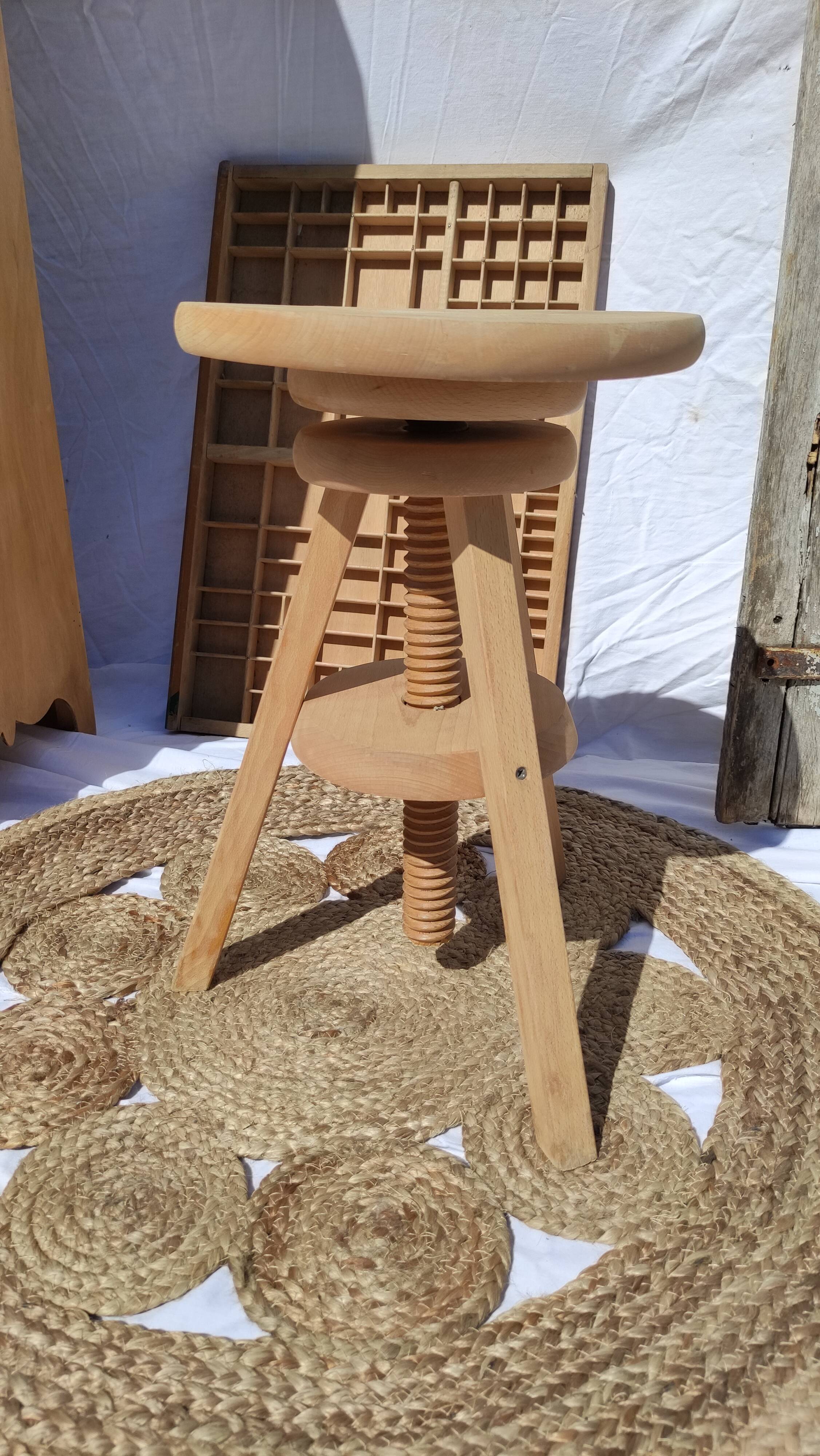 Vintage wooden stool with screws