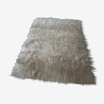 Tapis flokati en laine