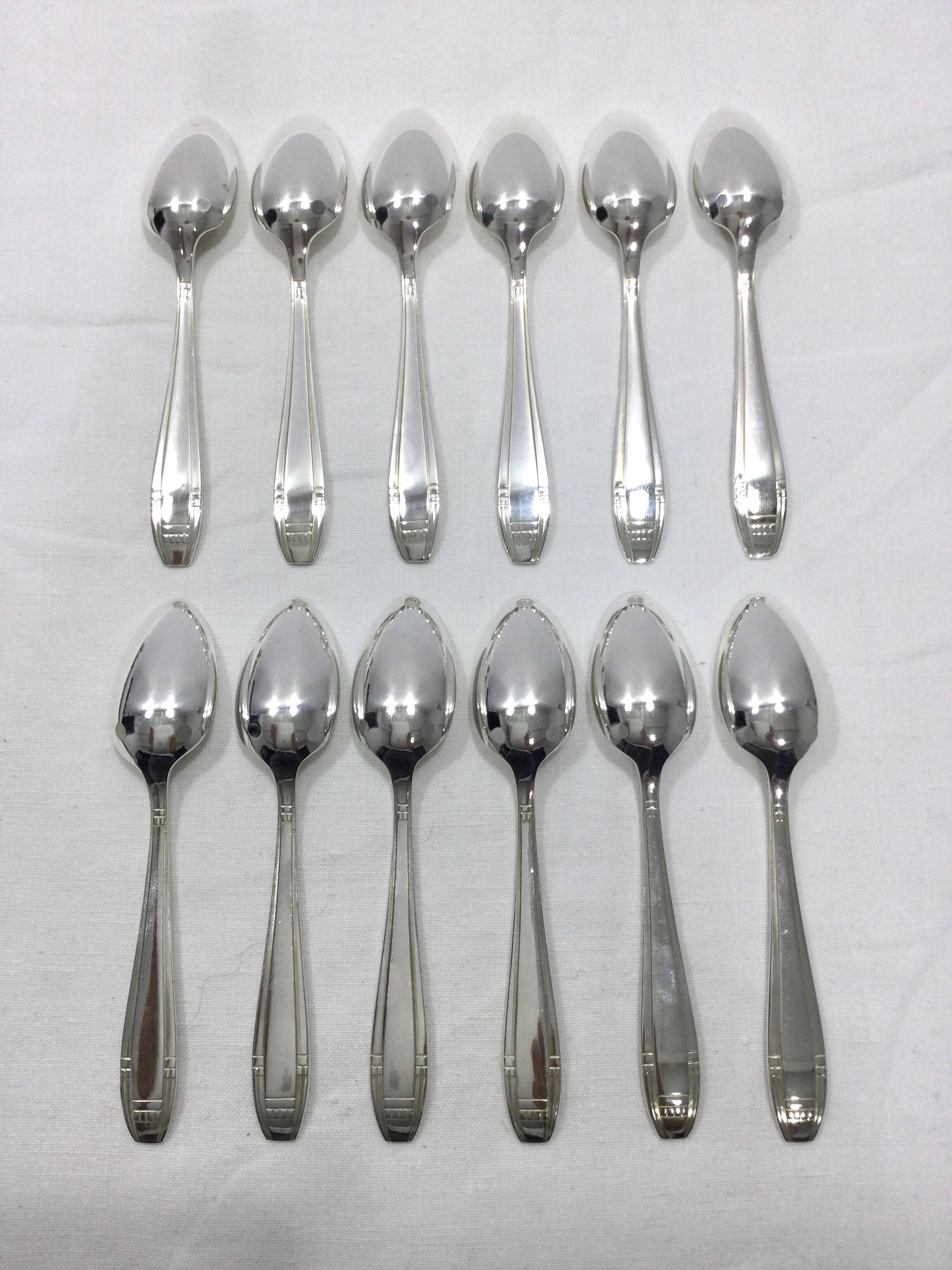 12 art deco mocha spoons made of silver metal