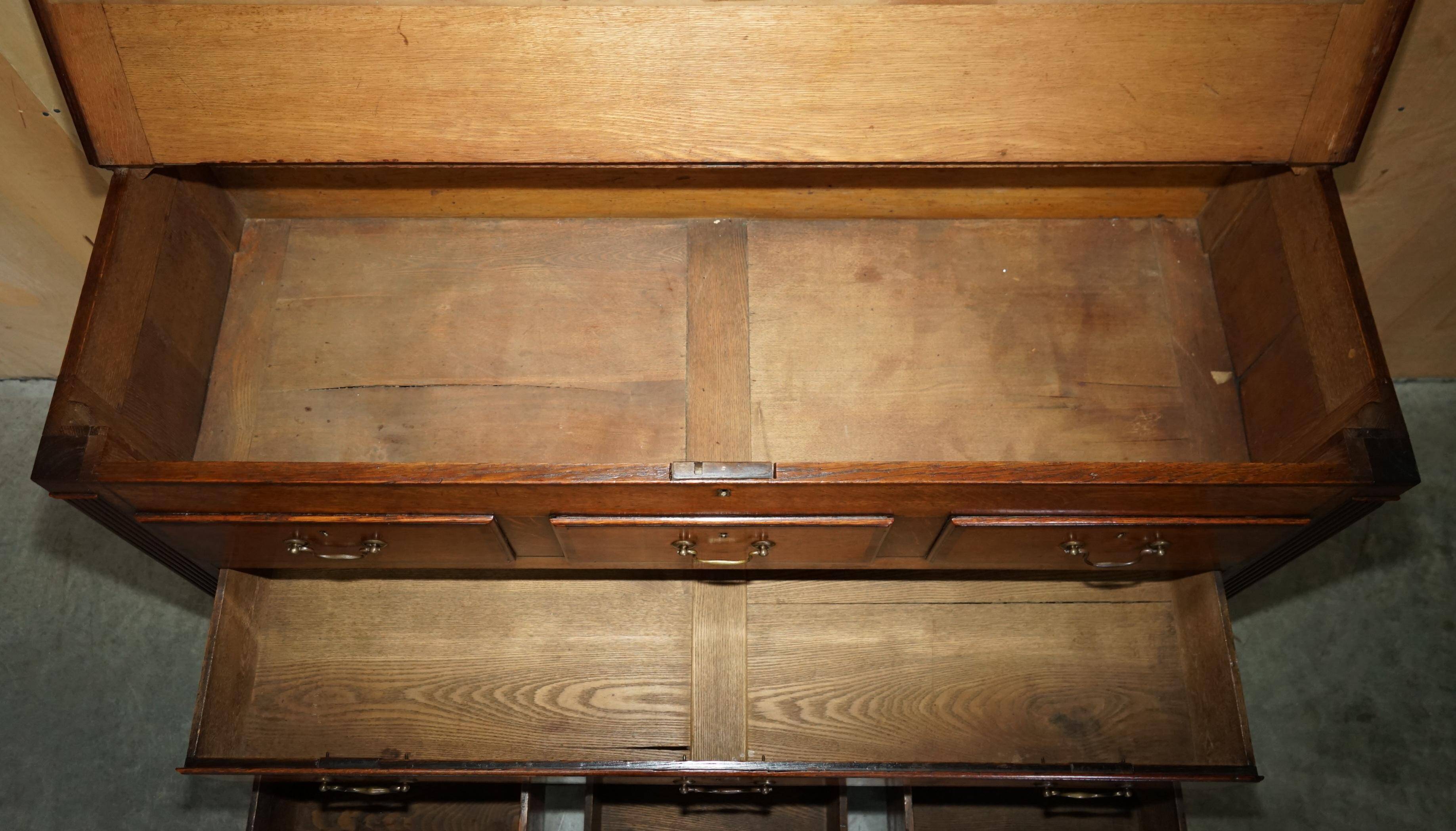 Georgian oak commode with a folding top, English, 18th century.