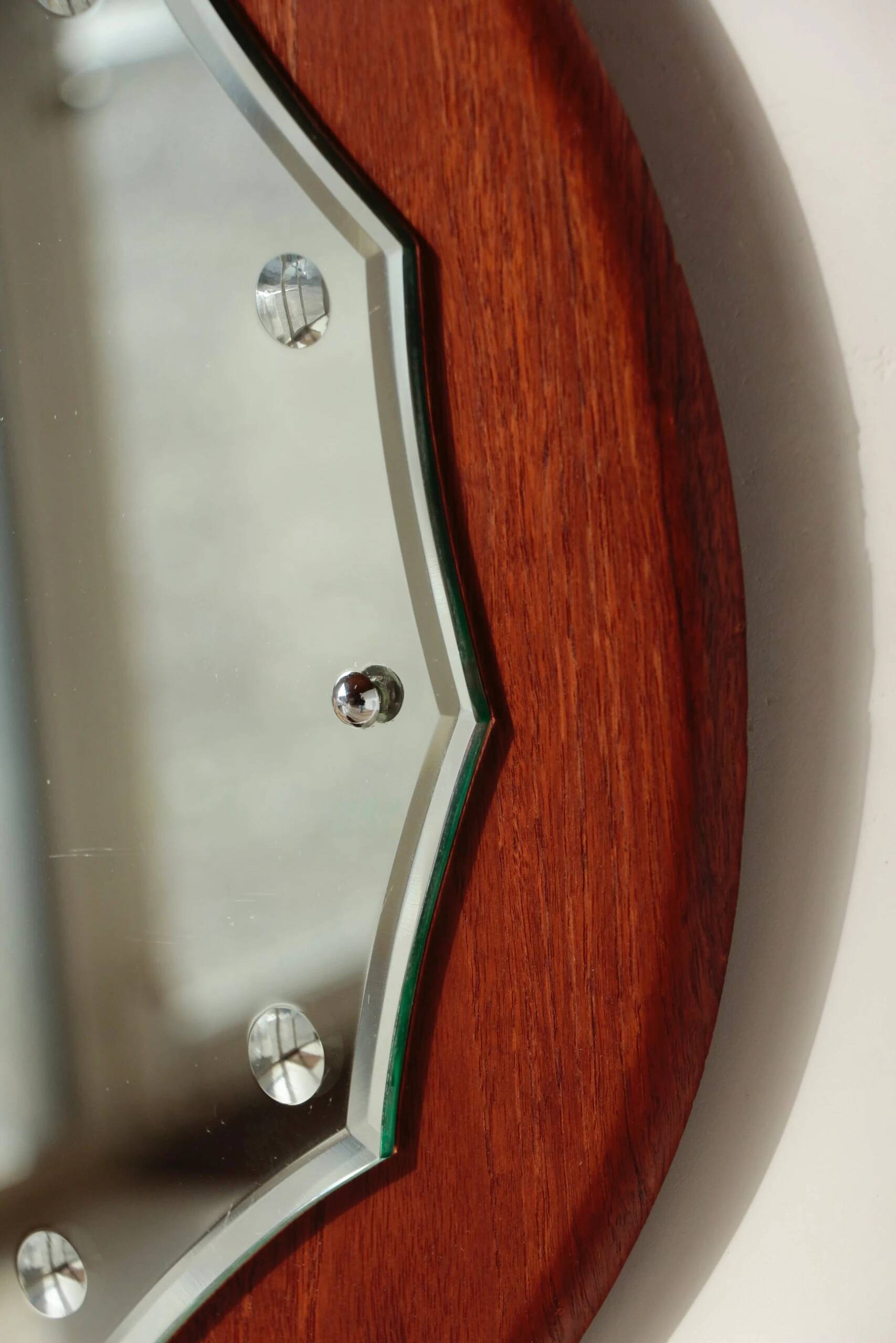 Vintage round teak mirror from the 1960s.