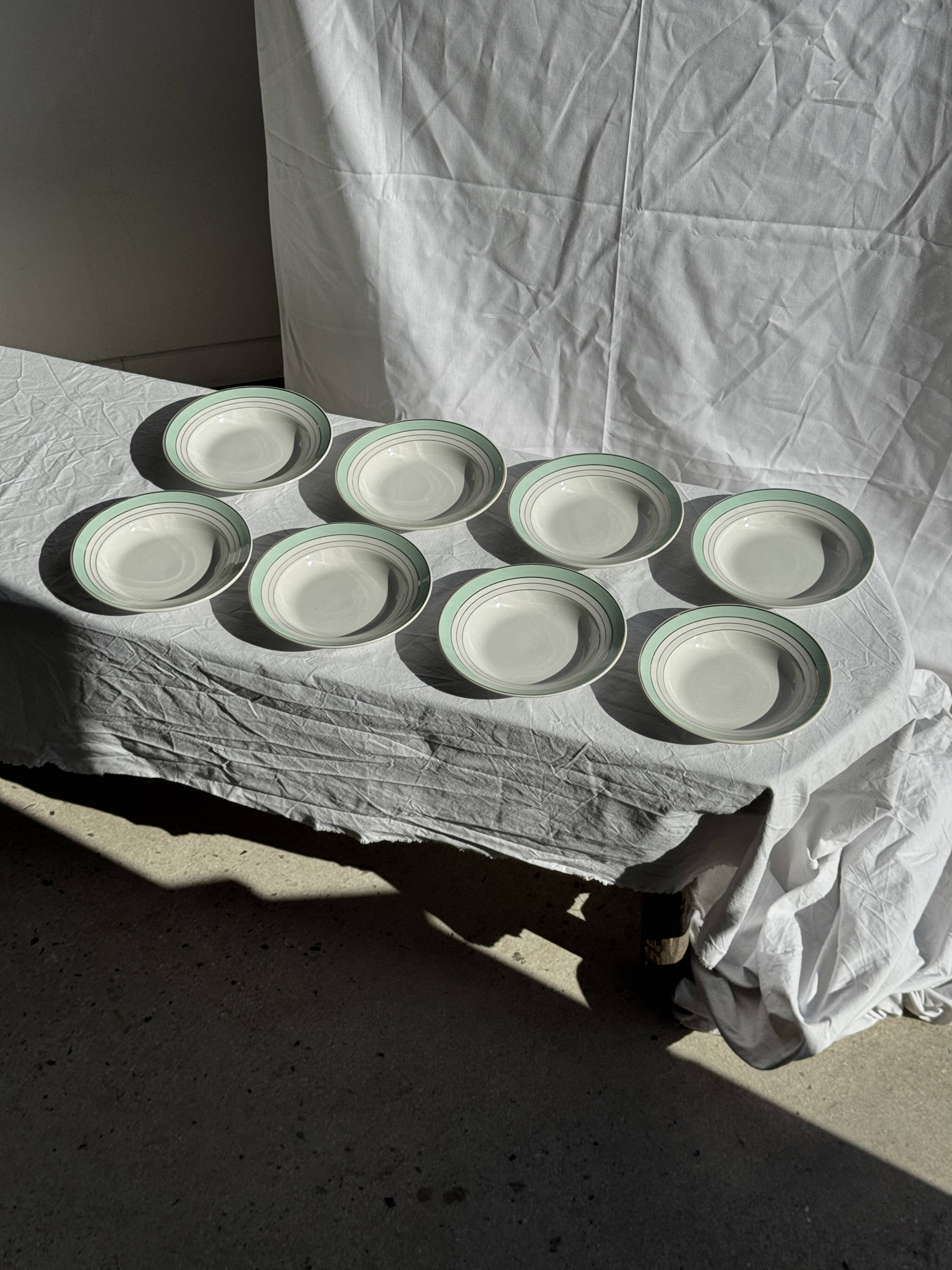 Set of 8 antique turquoise deep plates with a gold rim D22.5