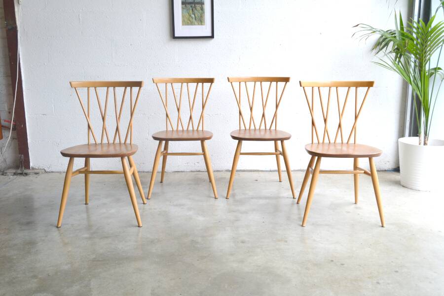 Series of four “candlestick” chairs by Lucian Ercolani