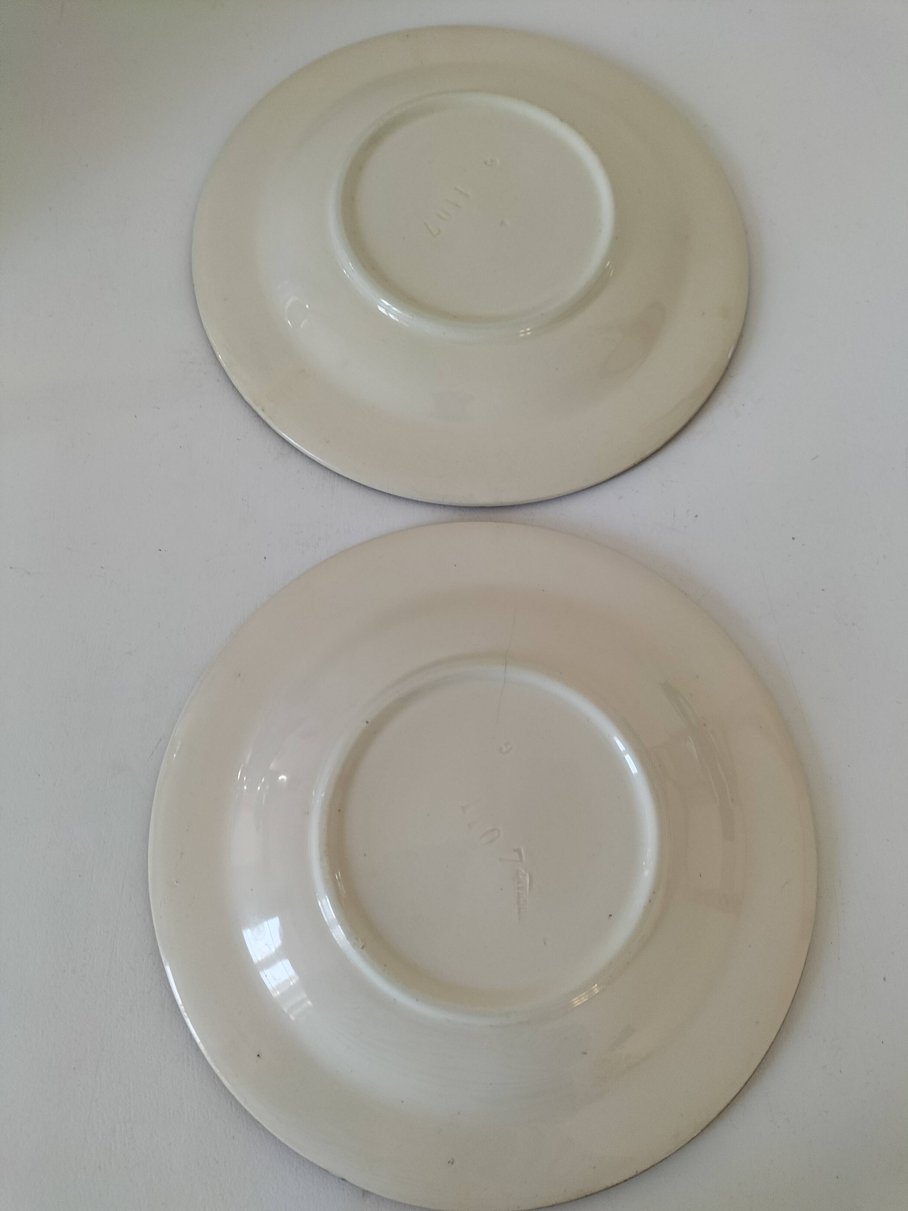 Two Longchamp earthenware plates.
