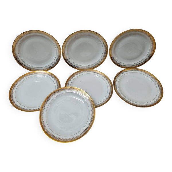 7 assiettes Limoges doré à l'or fin
